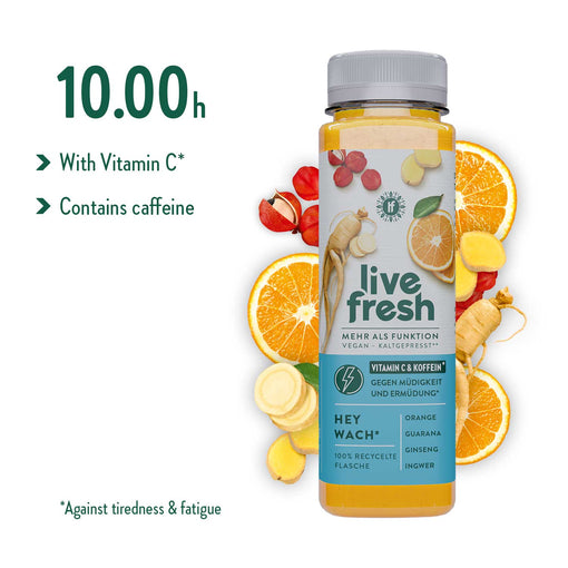 The image shows LiveFresh Hey Wach juice with ingredients such as orange, ginger, and guarana. It is surrounded by citrus fruits and ginger. The text highlights the vitamin C and caffeine content—ideal for combating fatigue.