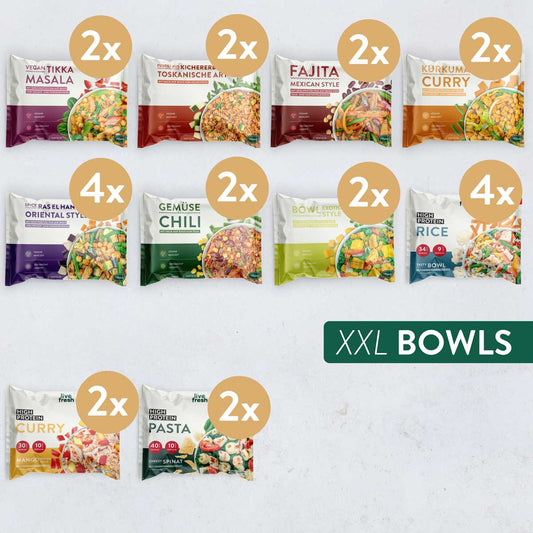 Große Live Fresh Office Box mit einer Auswahl verschiedener Fertiggerichte unter dem Titel "XXL BOWLS". Enthalten sind Vegan Tikka Masala. Kichererbsen Toskanische Art. Fajita Mexican Style. Kurkuma Curry. Ras el Hanout Oriental Style. Gemüse Chili. Bowl Exotic Style. High Protein Rice. High Protein Curry und High Protein Pasta in unterschiedlichen Mengen.